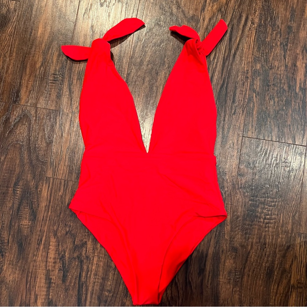 Sexy one piece, double lined with tie shoulder straps